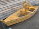 Лодка-песочница с веслами и штурвалом