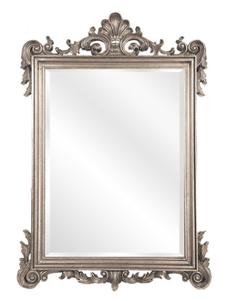 Зеркало в серебряной классической раме с цветочным орнаментом.