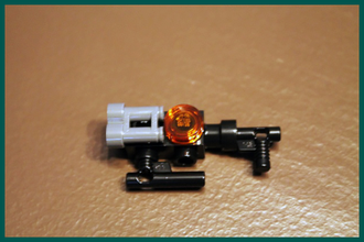 Сборная Модель Мощного Переносного Штурмового Бластера AD–AC1 из Набора LEGO # 75001.
