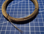 0.65 mm cable with brass coating.