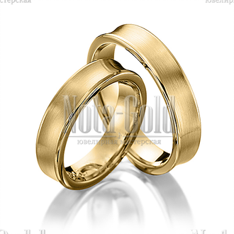 Классические обручальные кольца из желтого золота с вогнутым профилем