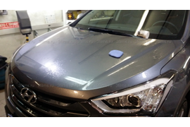 Защита ЛКП Hyundai Santa Fe антигравийной полиуретановой пленкой 3М капот, передний бампер, зеркала, стекла фар, проемы ручек дверей. Очистка капота от вкраплений. 