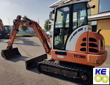 Стекло двери верхнее левое закаленное Terex TC35