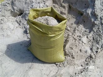 Песок в мешках