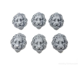 Lion head bas-reliefs