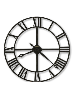 Часы настенные в черной металлической раме с римскими цифрами.