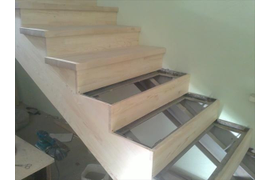 Отделка металлических лестниц деревом