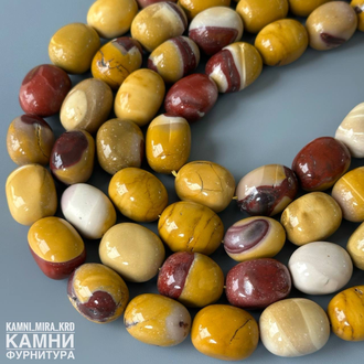 Яшма мукаит крупная олива 18-21 мм с раковинками, трещинками, цена за нить 19 см