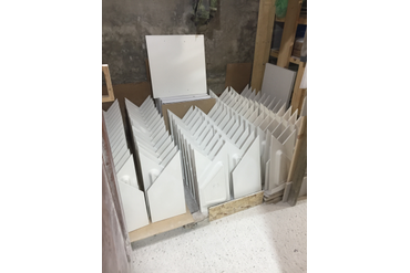 Высушенные панели IQ в очереди на упаковку