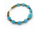"Восточная фантазия". Браслет из голубых бусин кварца и коралла