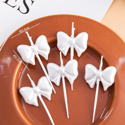 Свечи для торта "Бантик" (бел. перламутр), 5 шт./уп.