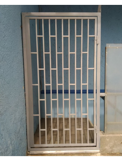 Металлические решетчатые тамбурные двери для технических и подъездных помещений