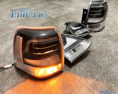 Cтопы Toyota Land Cruiser 200 07-15 в стиле 21 года LED (дымчатые серые)