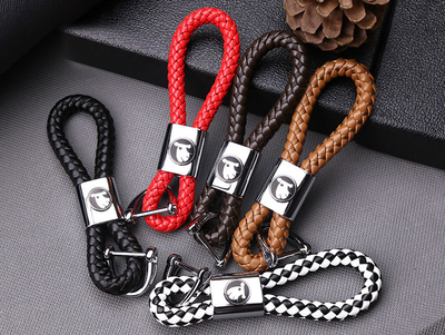 БРЕЛОК С КОЖАНЫМ ПЛЕТЁНЫМ РЕМЕШКОМ С ЛОГОТИПОМ АВТО