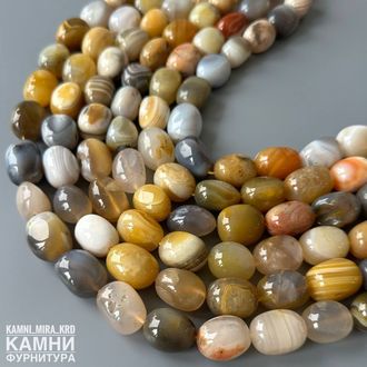 Агат крупная олива 18-23,5 мм с раковинками, трещинками, цена за нить 19 см