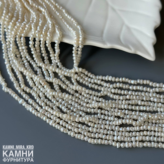 Жемчуг речной белый 1А фри-форм 3,5-3,8х2-2,8 мм, цена за нить 17 см