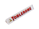 Белый молочный шоколад Toblerone White с медово-миндальной нугой (Швейцария), 100 г