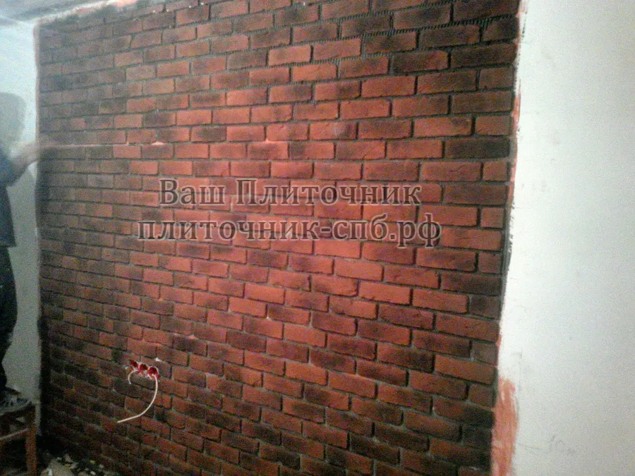 Укладка клинкера на стену.