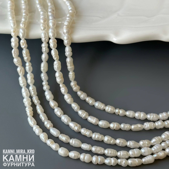 Жемчуг речной белый  рис барочный фри-форм 3,5-4,7х3-3,5 мм, цена за нить 17 см