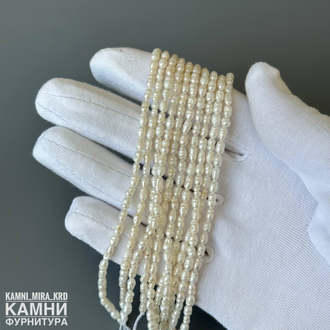 Жемчуг речной белый  рис барочный фри-форм 3,5-4,7х3-3,5 мм, цена за нить 17 см