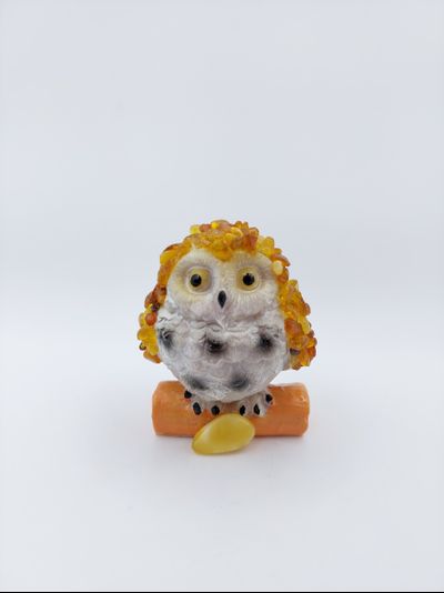 Сова малая на бревне