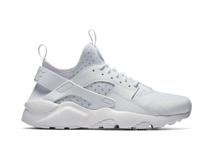 Nike huarache nere suola bianca hot sale