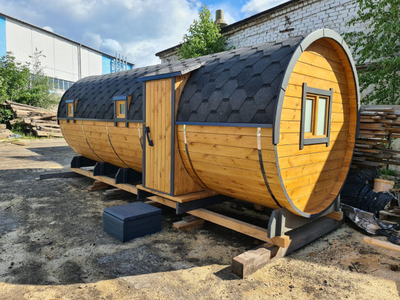 Круглая баня бочка с панорамным окном, длиной 6 метров и боковым входом