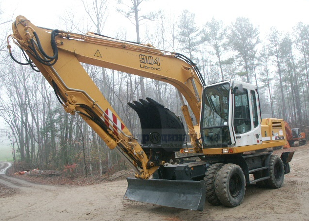 Колесный экскаватор A904 производства Liebherr