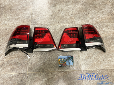 Cтопы Toyota Land Cruiser 200 07-15 в стиле 21 года LED (красные с темным низом)