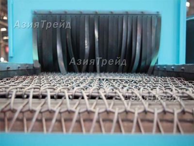 Вид загрузочного окна дробемета с сетчатым конвейером