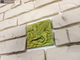 Декор-изразец к плитке под кирпич Kamastone Сказка 3071, мятно-зеленый с золотом