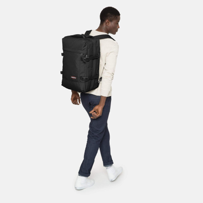 Парень с рюкзаком Eastpak Tranzpack Black