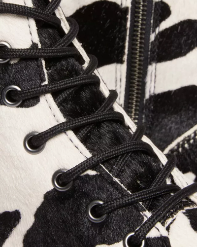 Cow print doc martens cheap