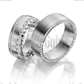 Обручальные кольца из белого золота с бриллиантами в обоих кольцах, широкие, с матовой поверхностью