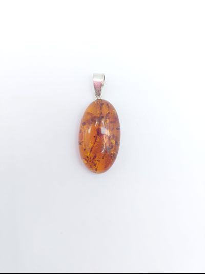 Кулон из медового янтаря