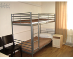 Кровать в четырехместном номере для женщин