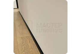 Изысканный дизайн: установка черного плинтуса Dollken WLK 20 для создания роскошного пространства.