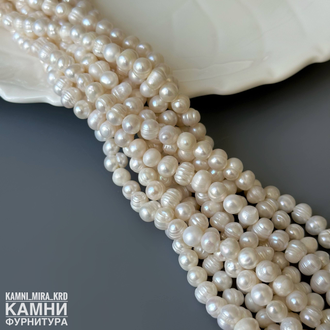 Жемчуг речной белый кругло-овальный фри-форм 5,7-6х6,5-8 мм, цена за нить 17 см