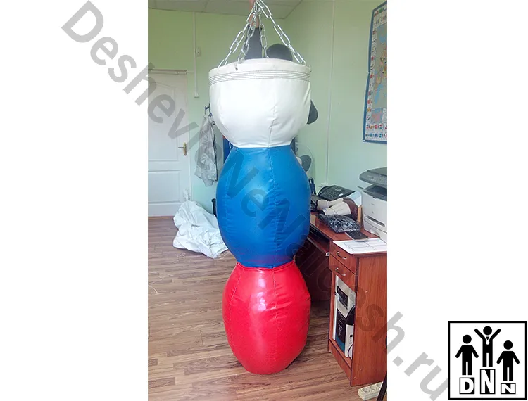 Тpёxceкциoнный боксерский мешок