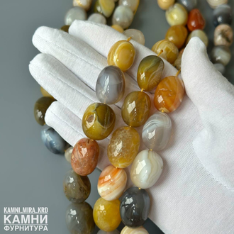 Агат крупная олива 18-23,5 мм с раковинками, трещинками, цена за нить 19 см