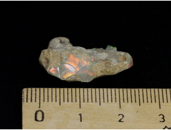 Опал благородный с яркой иризацией, Эфиопия (24*15*9 мм, 2,1 г) №23473