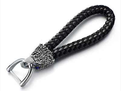 БРЕЛОК С КОЖАНЫМ ПЛЕТЁНЫМ РЕМЕШКОМ «ГОЛОВА ОРЛА»