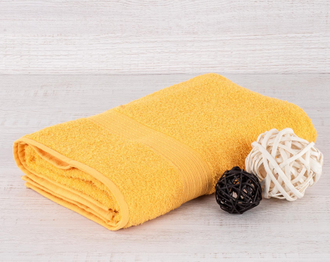 Желтое полотенце оптом махровое пр-во Байрамали (бордюр «косичка»)