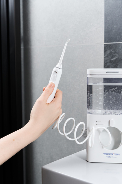 Стационарный ирригатор для полости рта OMIO-100 и звуковая зубная щетка