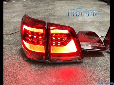 Cтопы Toyota Land Cruiser 200 07-15 в стиле 21 года LED (красные с белым низом)
