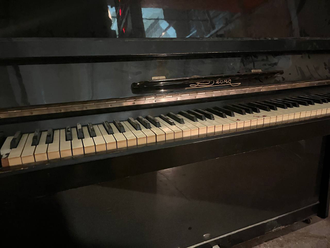 Piano with electronics and stash