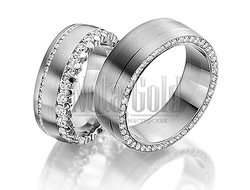 Обручальные кольца из белого золота с бриллиантами в обоих кольцах, широкие, с матовой поверхностью