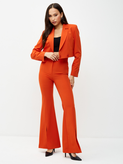 Брюки клеш от колена. Оранжевый