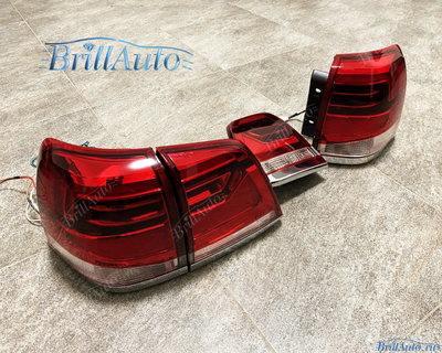 Cтопы Toyota Land Cruiser 200 07-15 в стиле 21 года LED (красные с белым низом)