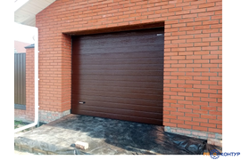 Двое секционных ворот DoorHan в кирпичный гараж 2500х2450 для клиента в посёлке Новомосковка. Ручное управление, цвет 8017